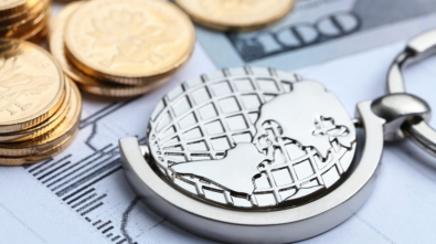 Coins, paper money and globe on white Statistic form background