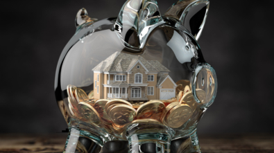 Glass piggy bank with coins and house. Mortgage, savings for real estate or to buy a house concept. 3d illustration