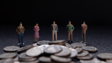 Miniature people: Group of small businessmen standing on coin with  Business Growth concept.