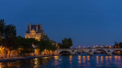 View from the Seine River at night in Paris, France