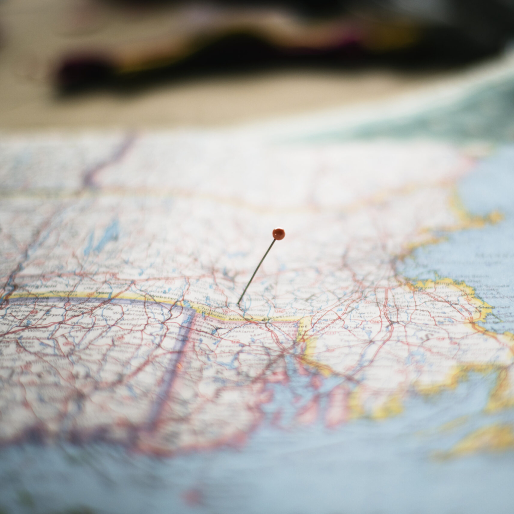 Closeup of pin on the map planning travel journey
